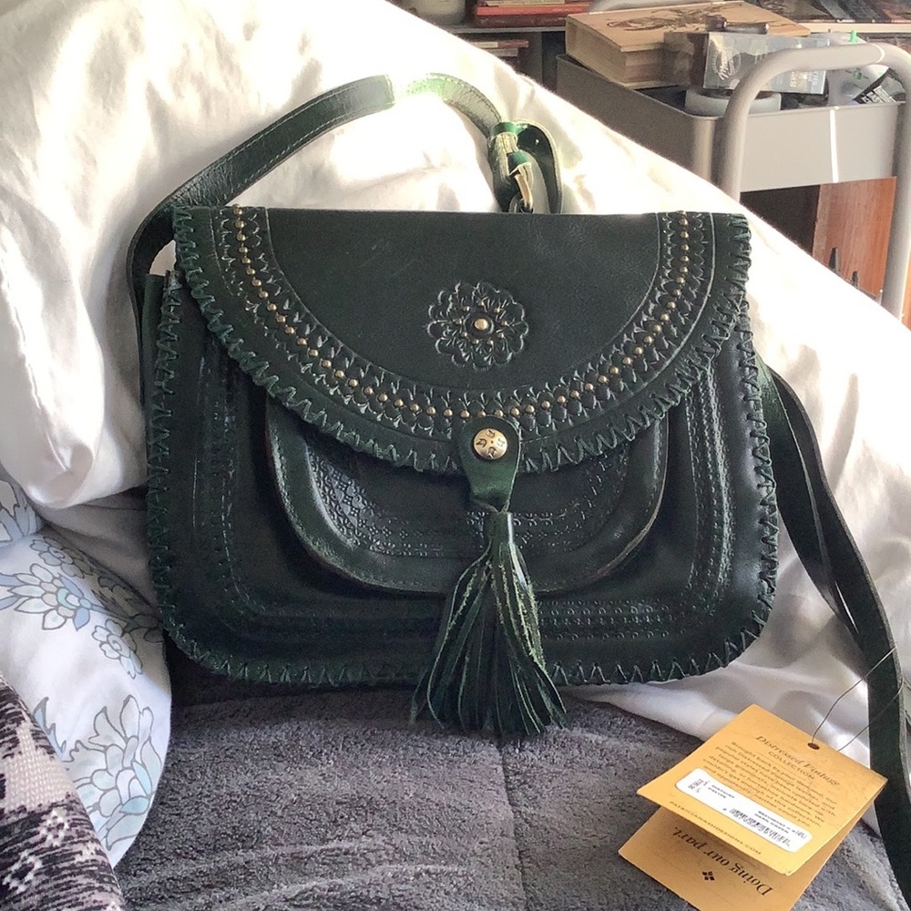 Distressed vintage collection Patricia Nash hand bag. Dark Green. Never used..